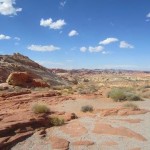 Red rock and sand with blue sky and a few clouds at Valley of Fire