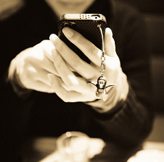 Hands holding a smart phone